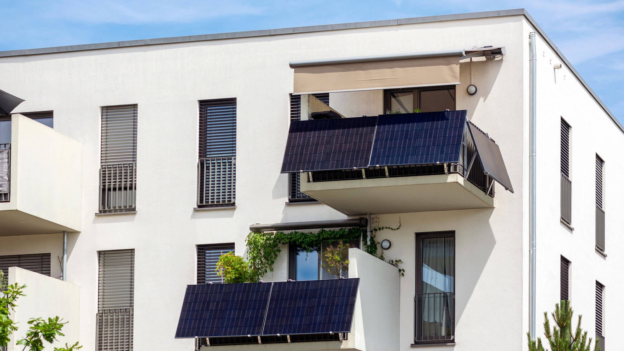 Modern Balcony with Solar Panels Station of Modern Facade Residential Apartment Building in Eco City