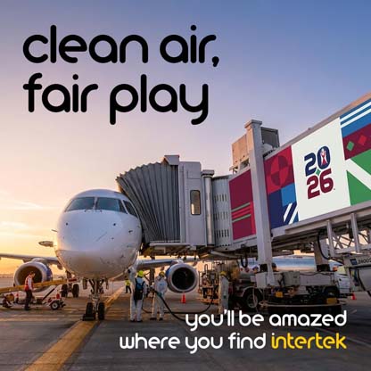 A boarding tunnel connected to a parked passenger jet