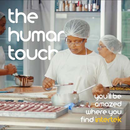 Cooks preparing food in a kitchen